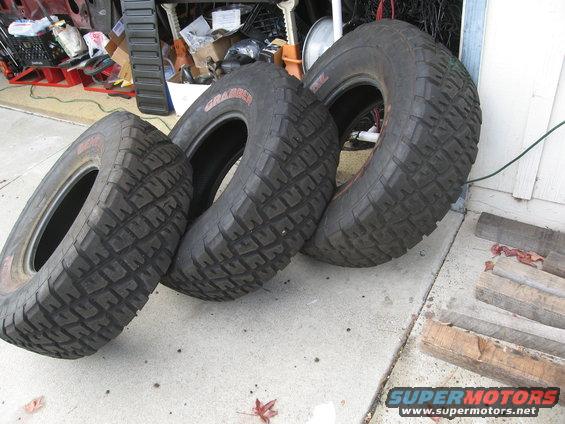 Three off-road tires with aggressive tread patterns, labeled "GRABBER"