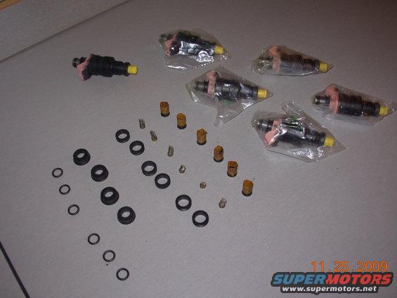 dscn0207.jpg A set of fuel injectors that were tested cleaned, along with new screen and seals.
