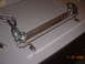 I cleaned up the fuel rail a bit, it looked nasty before. It looked like rust.
