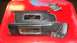 1990 Ford Mustang - A pair of black sun visors with illuminated vanity mirrors are displayed on a red background.