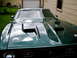 1972 Ford Mustang - The distinctive hood scoops and pins on this 1972 Ford Mustang Mach-1 are clearly visible.