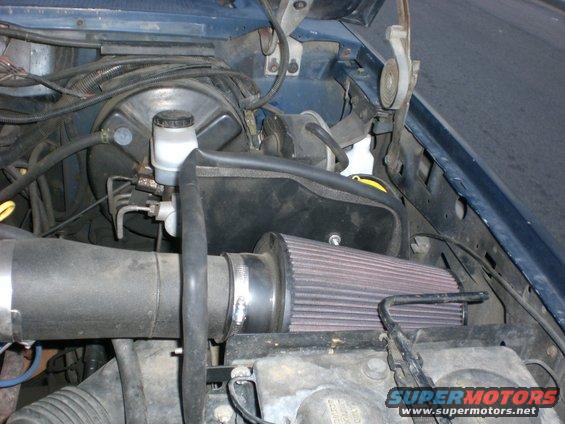 Engine bay with K&N air filter and brake fluid reservoir