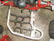 1987 Honda 250 R - ATV footpeg and engine detail, showing the frame and chain drive.