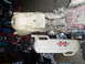1987 Honda 250 R - Close-up view of an ATV's engine and a large IMS auxiliary fuel tank.