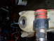 1987 Honda 250 R - Close-up of a fuel tank and intake system, likely from an off-road vehicle.