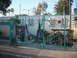 1991 Ford Bronco - A turquoise gate guards a yard decorated for Christmas with a nativity scene and festive ornaments.