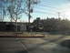 1991 Ford Bronco - A street corner in a populated area with several vehicles visible.