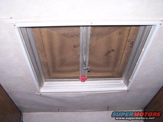 Interior RV ceiling vent with a crank handle and screen