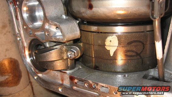 Transmission torque converter with handwritten markings and a white sticker