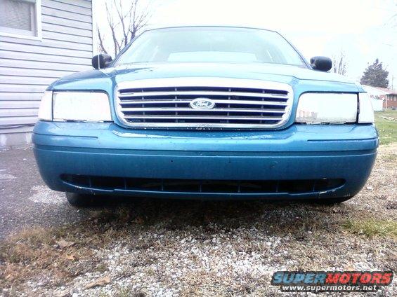 Blue 1998 Ford Crown Victoria front grille and bumper