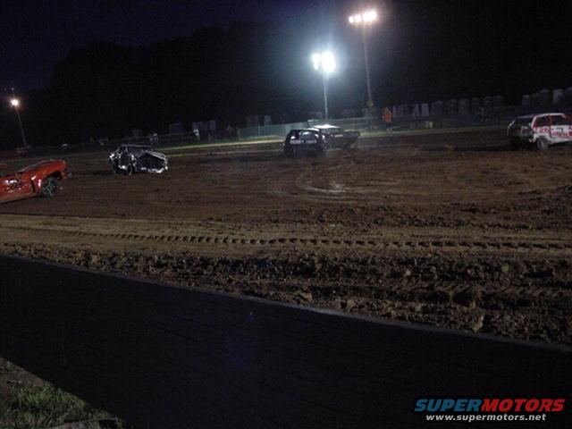 And yes, that IS a Geo Metro in the feature.  Only three cars were in the 4-cylinder heat, so they all made into the feature.  He didn't last more than one hit.  Then he got scared, waved at the flag guy and said his car was on fire, so they would stop the derby.  He jumped out of the car and off the pit.  I can't blame him.