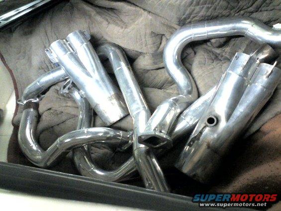 Chrome exhaust headers with multiple pipes and flanges