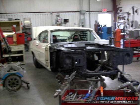 1963 Ford Fairlane front end removed, white body, in workshop