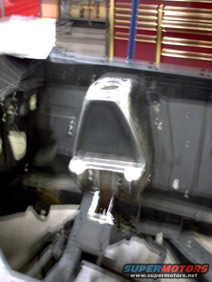 Engine bay structure with metal bracing