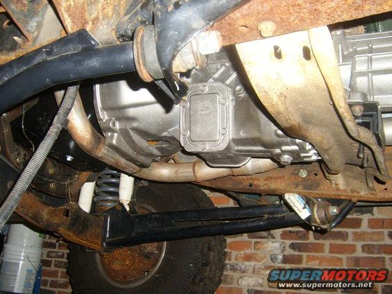 Underbody view of vehicle transmission and suspension components