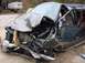 1995 Ford Bronco - This heavily damaged SUV shows extensive front-end collision damage.
