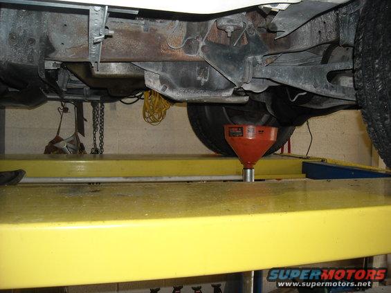 picture-009.jpg I actually had to lower the lift because my oil catch was too short.
This isn't a problem with the regular cars but with the Bronco, it sits so much higher that I had to drop the lift down so oil did not go everywhere.