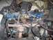 1966 Ford Bronco - The engine bay of a 1966 Ford Bronco is shown, its blue engine block and black air cleaner assembly.