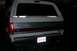 1992 Ford C-350 (Centurion Conversions) - Rear view of a 1992 Ford C-350 Centurion Conversions truck, showing the tailgate and camper shell.