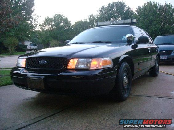 Black 2003 Ford Crown Victoria police car, 3q-front view