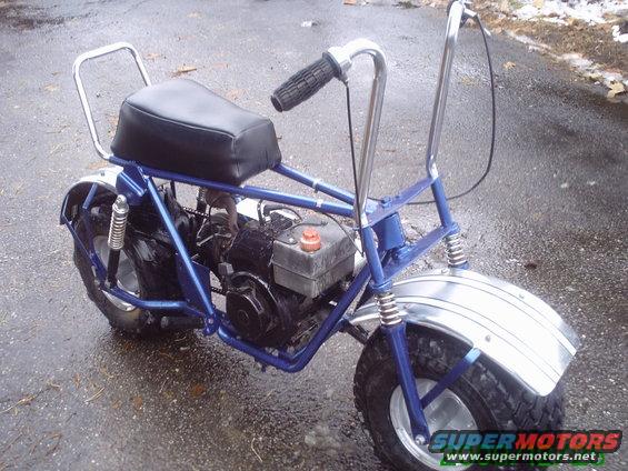 Blue mini bike with chrome handlebars and fenders