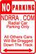 1992 Ford Mustang - This sign indicates 'No Parking' and specifies rules for NDRRA.COM members, with a warning for others.