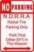 1992 Ford Mustang - This sign indicates restricted parking and has a humorous, albeit vulgar, message.