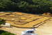 1986 Ford Bronco - Outdoor RC car track with a white van parked nearby.