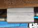 1971 Ford F-100 - Close-up of a Flowmaster muffler, showing patent information stamped on its side.