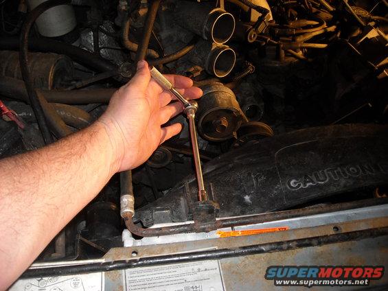 picture-010.jpg A 10MM is used for the fan shroud and the radiator supports. The extension is helpful at this stage.