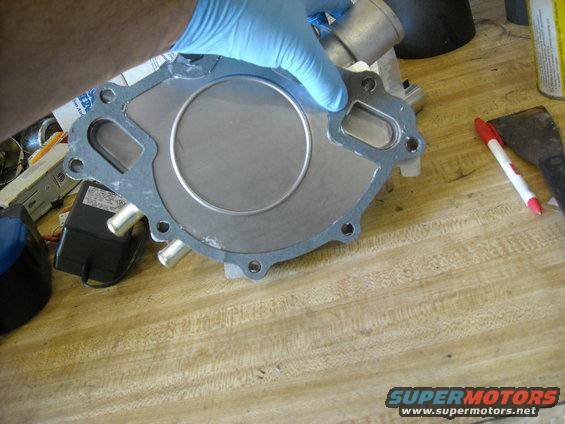 picture-029.jpg Once you put the gasket on and put the sealant on the other side, wipe off and excess.
You DID clean the engine block already, right?