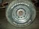 1971 Ford F-100 - Close-up of a BFGoodrich All-Terrain T/A tire and steel wheel.