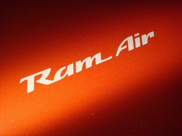 Ram Air decal on orange car
