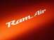 2001 Pontiac Trans Am - Close-up of a "Ram Air" decal on an orange vehicle.