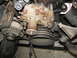 1986 Ford Bronco - loosened wp bolts, removed one at a time and poked thru cardboard in the position they go.