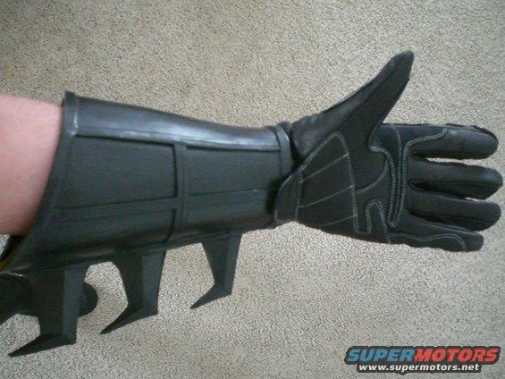 Black Batman glove with gauntlet and spikes, thumb up