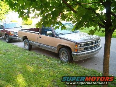Tan 1988 Chevrolet C/K Pickup truck, 3q front view, parked on street