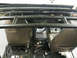 1996 Ford Bronco - Vehicle interior with roll cage and seats visible, appears to be undergoing modification.
