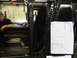1996 Ford Bronco - A document with installation instructions is attached to the interior door frame of a vehicle.