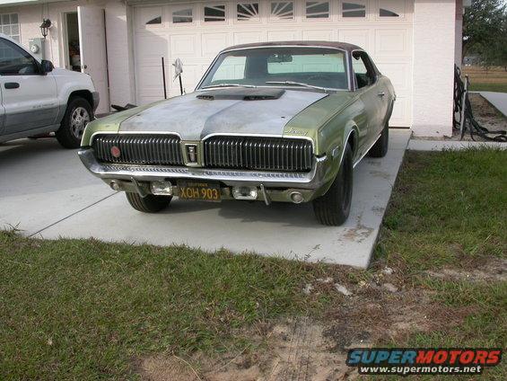 1968 Mercury Cougar parked in front of a garage, front view