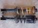 1993 Mazda MX-3 - Comparison MX-3 Rear Strut with Koni Damper insert. Top one fitted with Eunos 30x King Spring - Bottom one fitted with MX-3 H&R Spring