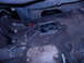 1989 Ford Bronco - Close-up of a Ford transmission plate, showing part identification details.