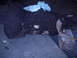 1989 Ford Bronco - Automatic transmission part shown resting on blocks with a blue shop towel on top.