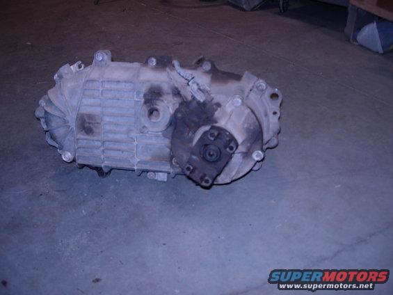 transfer case sitting on concrete floor
