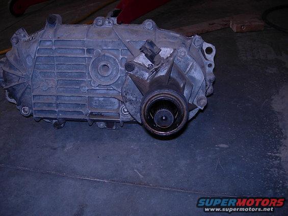 Gray metal transfer case with splined output shaft and electrical connector