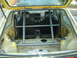 1983 Volkswagen Rabbit - Interior view of a 1983 Volkswagen Rabbit, modified with racing seats and a roll cage.