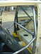 1983 Volkswagen Rabbit - Custom roll cage installed in the interior of a car, with sound deadening visible on the floor.