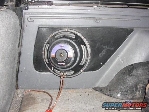 Speaker mounted in gray interior panel