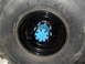 1997 Ford Ranger - A close-up view of a tire and wheel hub assembly.