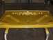 1971 Chevrolet Camaro - Underside of a gold car hood, freshly painted and awaiting reinstallation.